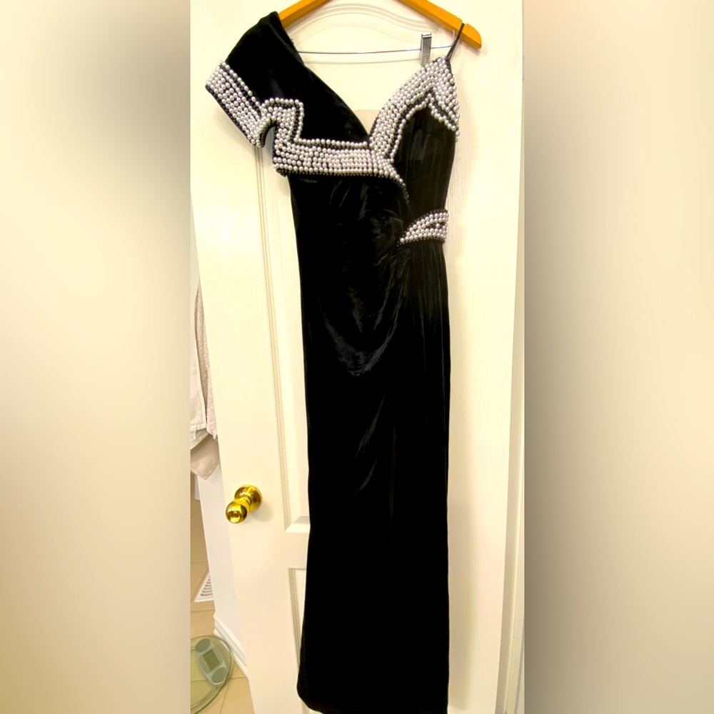 Beautiful elegant formal dress, unique styles. Never used.